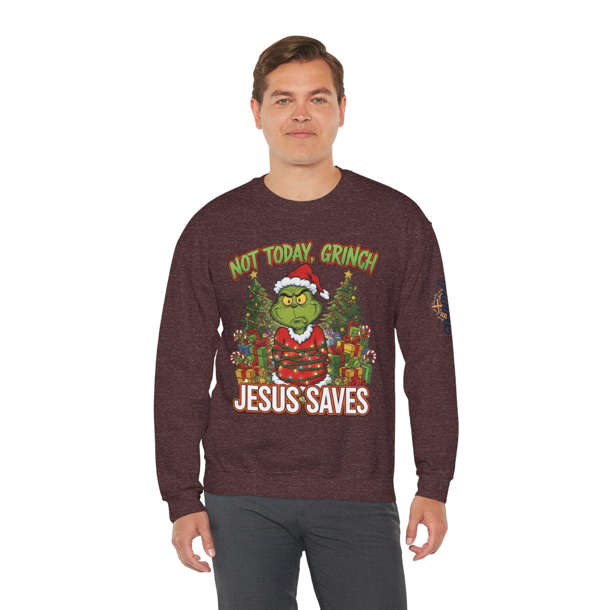 🎄 Not Today, Grinch – Jesus Saves | Funny Christian Christmas Sweatshirt | Sulking Grinch & Glowing Cross | Bold Neon Faith Tee by Uplifted Gear Printify