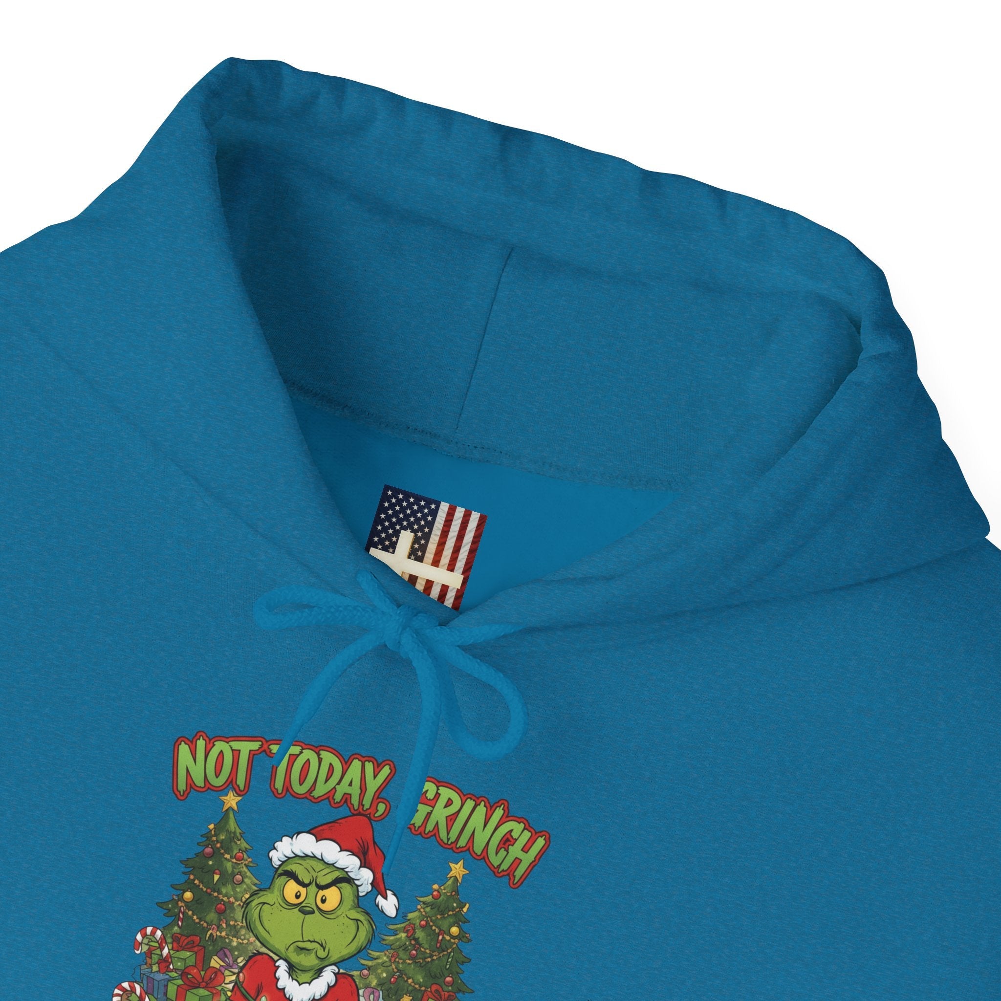 🎄 Not Today, Grinch – Jesus Saves | Funny Christian Christmas Hoodie | Sulking Grinch & Glowing Cross | Bold Neon Faith Tee by Uplifted Gear Printify