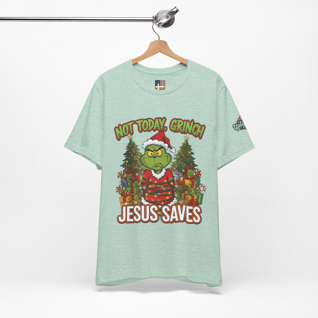 🎄 Not Today, Grinch – Jesus Saves | Funny Christian Christmas T-Shirt | Sulking Grinch & Glowing Cross | Bold Neon Faith Tee by Uplifted Gear Printify