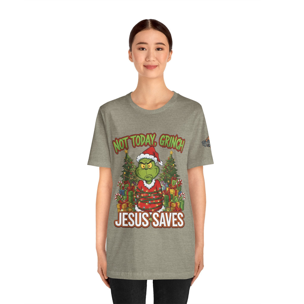 🎄 Not Today, Grinch – Jesus Saves | Funny Christian Christmas T-Shirt | Sulking Grinch & Glowing Cross | Bold Neon Faith Tee by Uplifted Gear Printify