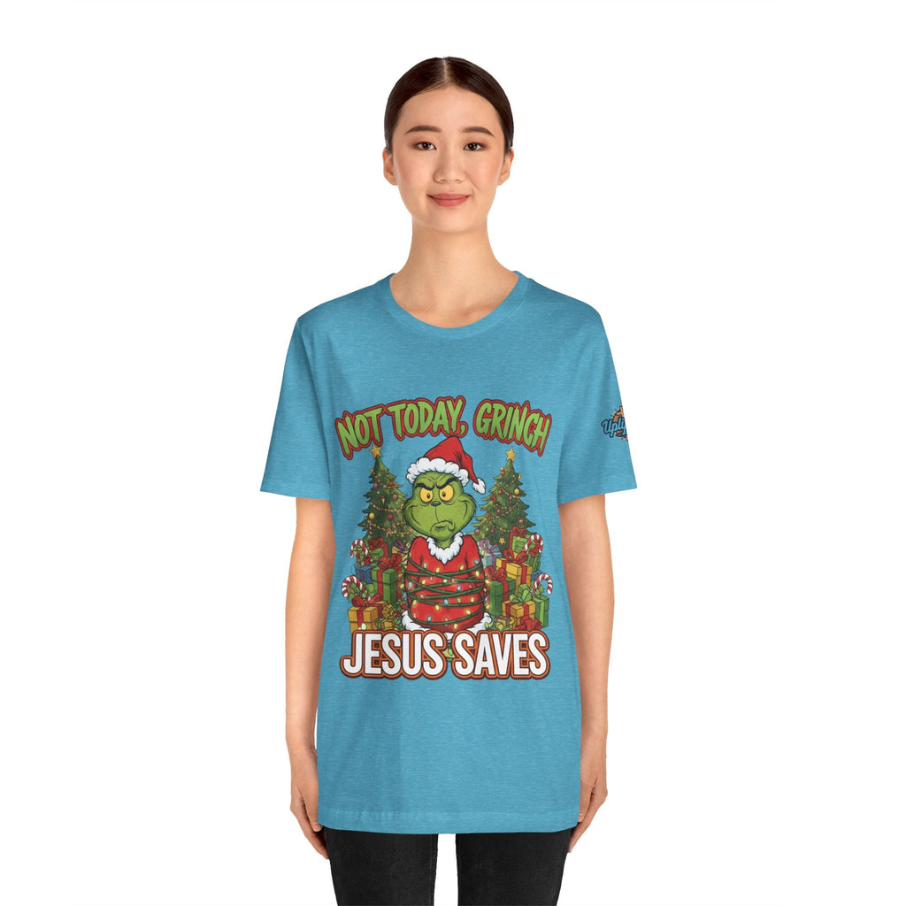 🎄 Not Today, Grinch – Jesus Saves | Funny Christian Christmas T-Shirt | Sulking Grinch & Glowing Cross | Bold Neon Faith Tee by Uplifted Gear Printify