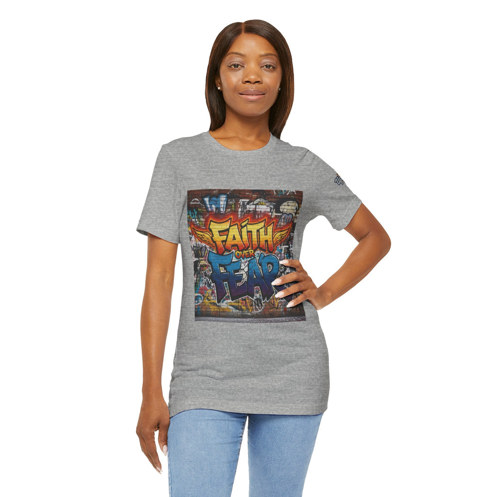 Faith Over Fear T-shirt – Graffiti Wall Christian T-shirt for Bold 2 Corinthians 5:7 Streetwear & Unshakable Faith Printify