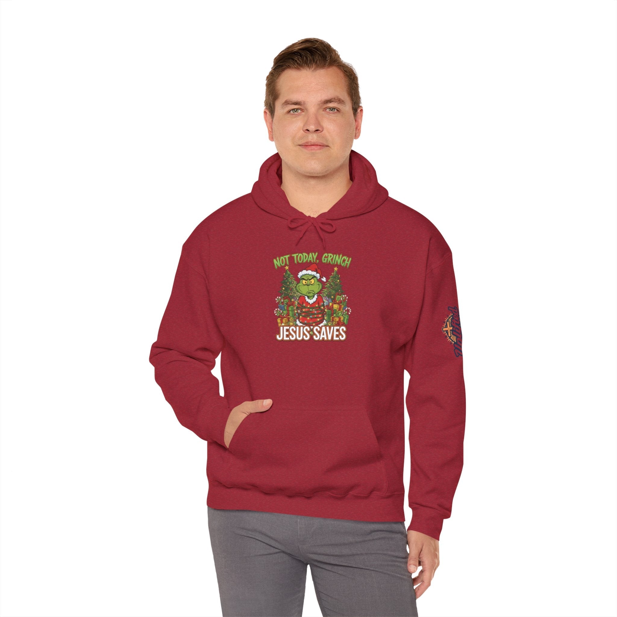 🎄 Not Today, Grinch – Jesus Saves | Funny Christian Christmas Hoodie | Sulking Grinch & Glowing Cross | Bold Neon Faith Tee by Uplifted Gear Printify