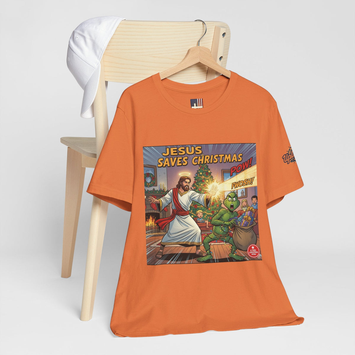 Jesus Saves Christmas T-shirt – Grinch vs Savior Light Battle Christian T-shirt for Hilarious Holiday Faith & True Joy Printify