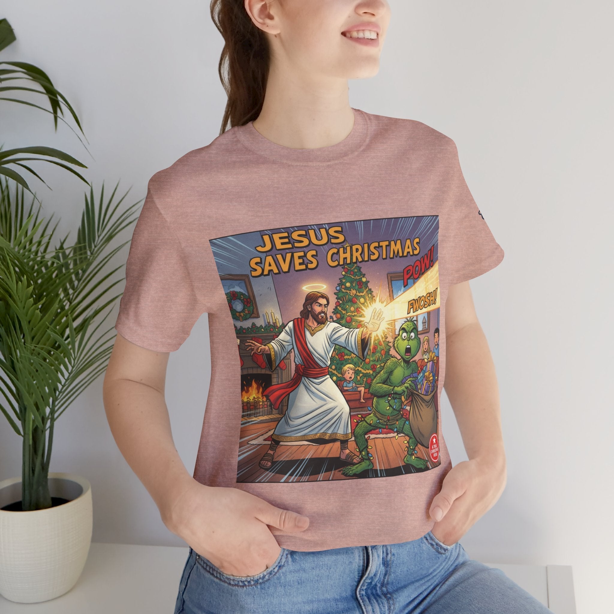 Jesus Saves Christmas T-shirt – Grinch vs Savior Light Battle Christian T-shirt for Hilarious Holiday Faith & True Joy Printify