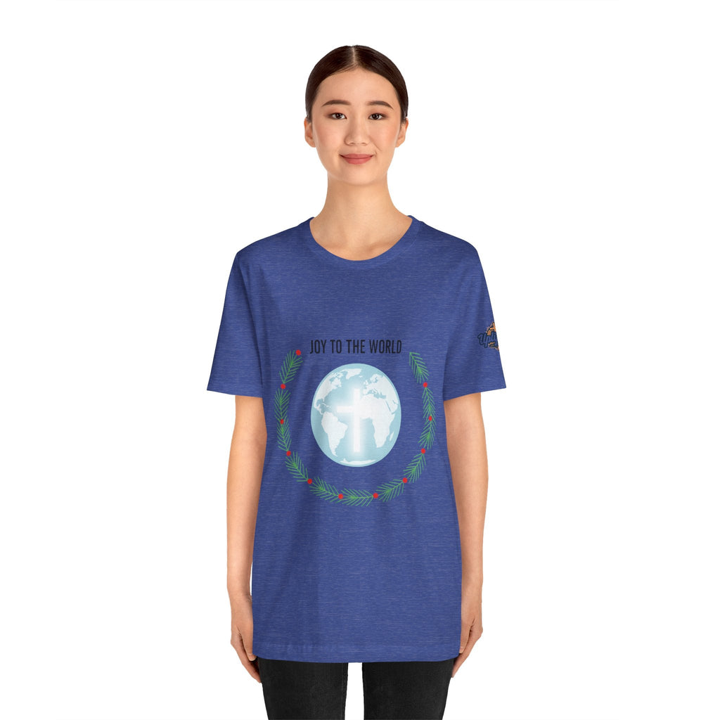 Joy to the World T-shirt – Wreath Earth Nativity Christian Christmas T-shirt for Isaiah 9:6 Holiday Faith & Festive Joy Printify