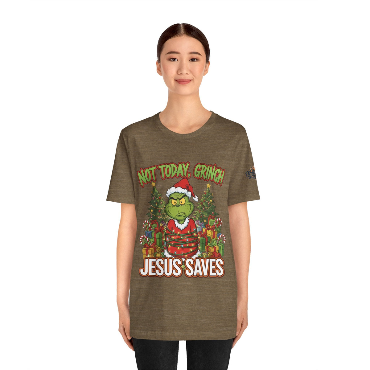 🎄 Not Today, Grinch – Jesus Saves | Funny Christian Christmas T-Shirt | Sulking Grinch & Glowing Cross | Bold Neon Faith Tee by Uplifted Gear Printify