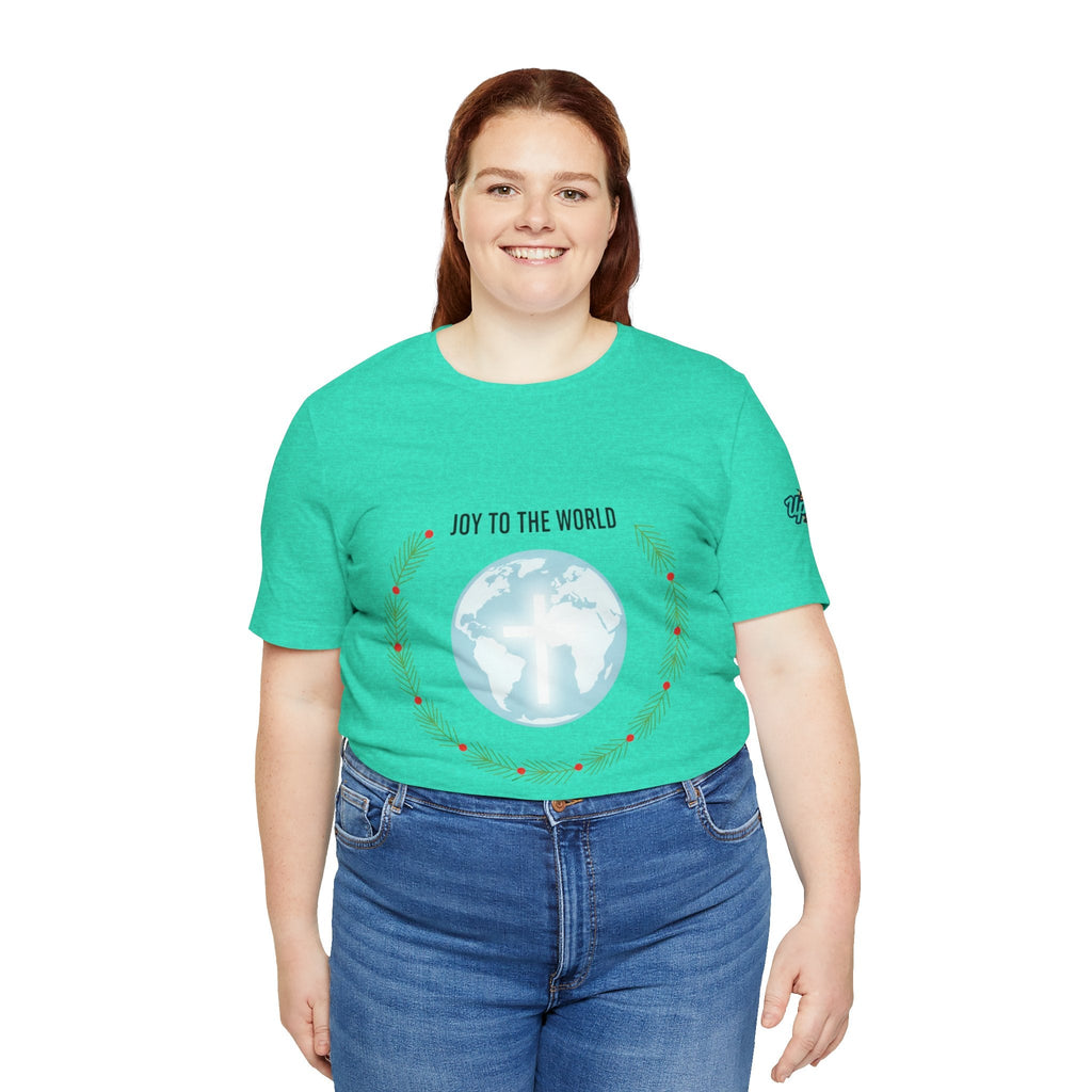 Joy to the World T-shirt – Wreath Earth Nativity Christian Christmas T-shirt for Isaiah 9:6 Holiday Faith & Festive Joy Printify
