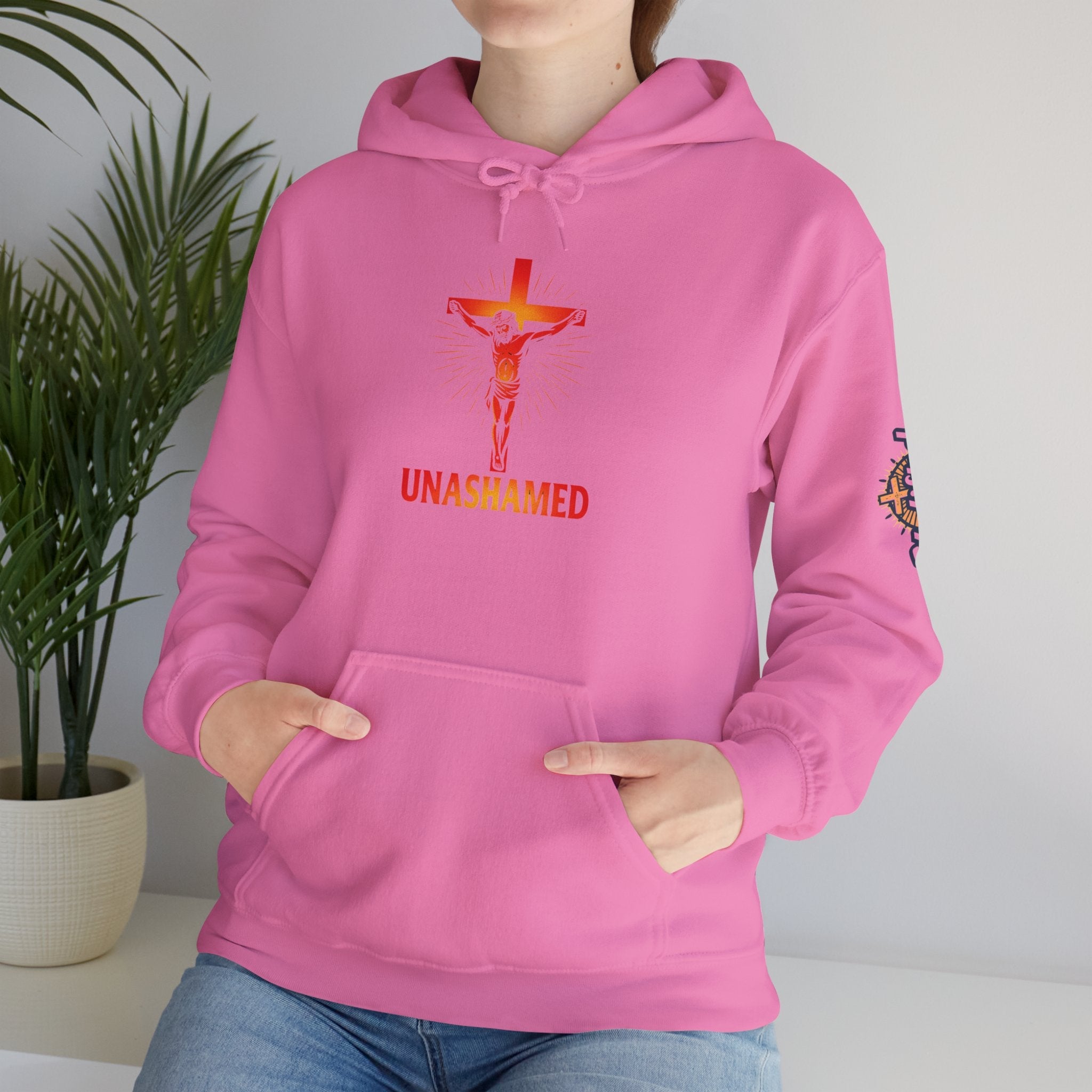 Unashamed Hoodie – Romans 1:16 Crucifixion Christian Sweatshirt for Bold Unwavering Faith Printify