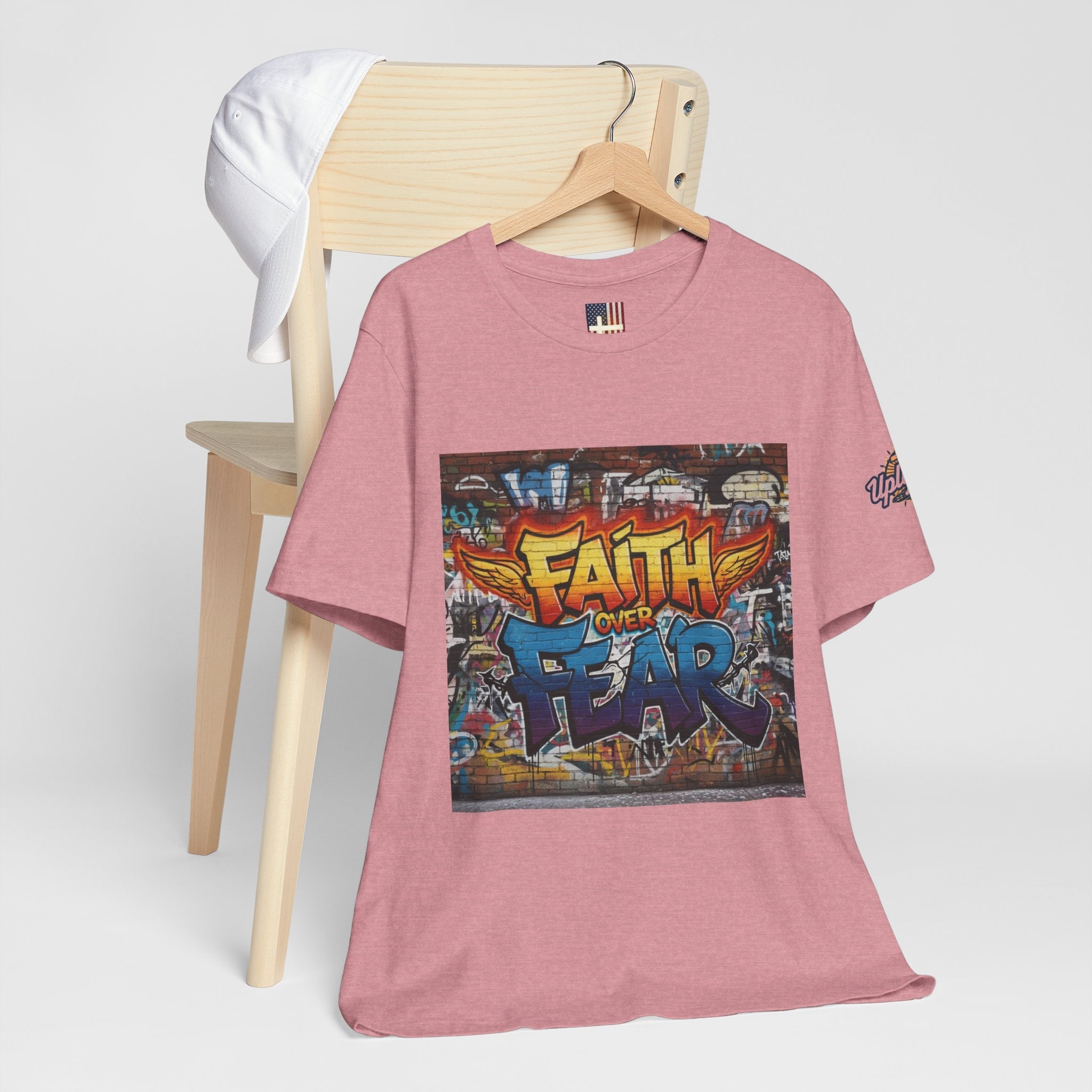 Faith Over Fear T-shirt – Graffiti Wall Christian T-shirt for Bold 2 Corinthians 5:7 Streetwear & Unshakable Faith Printify
