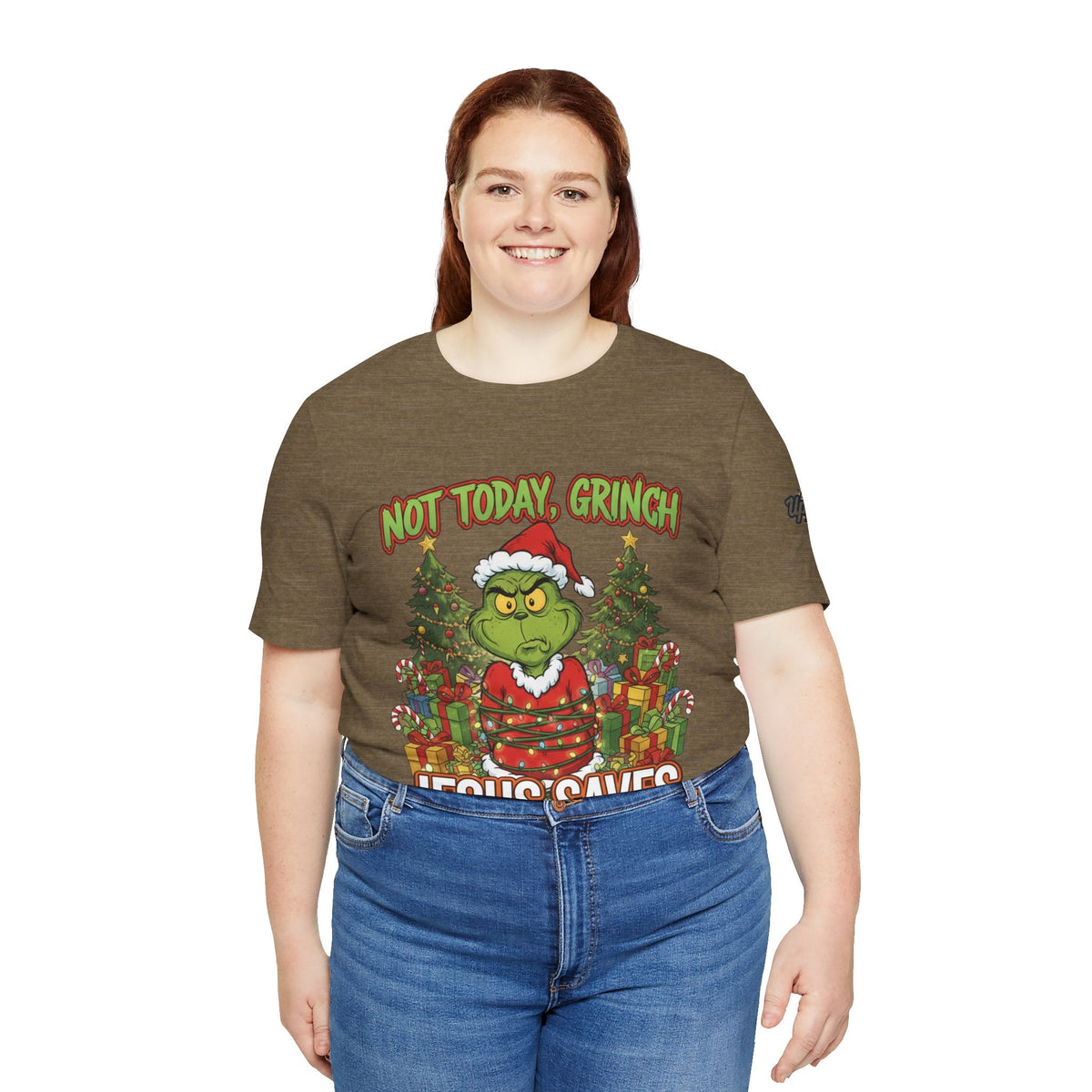 🎄 Not Today, Grinch – Jesus Saves | Funny Christian Christmas T-Shirt | Sulking Grinch & Glowing Cross | Bold Neon Faith Tee by Uplifted Gear Printify