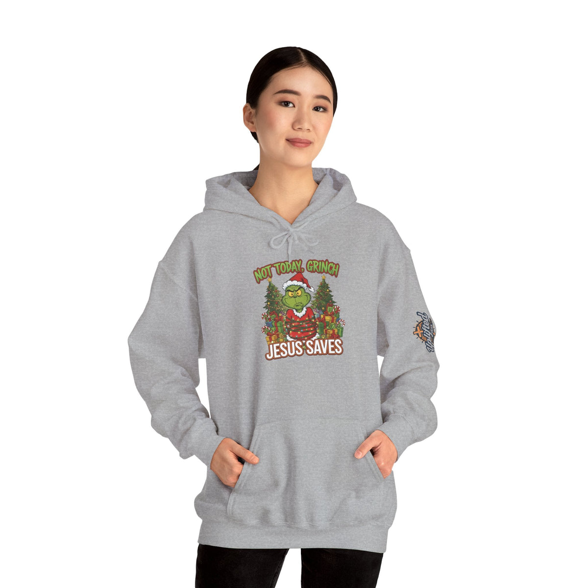🎄 Not Today, Grinch – Jesus Saves | Funny Christian Christmas Hoodie | Sulking Grinch & Glowing Cross | Bold Neon Faith Tee by Uplifted Gear Printify