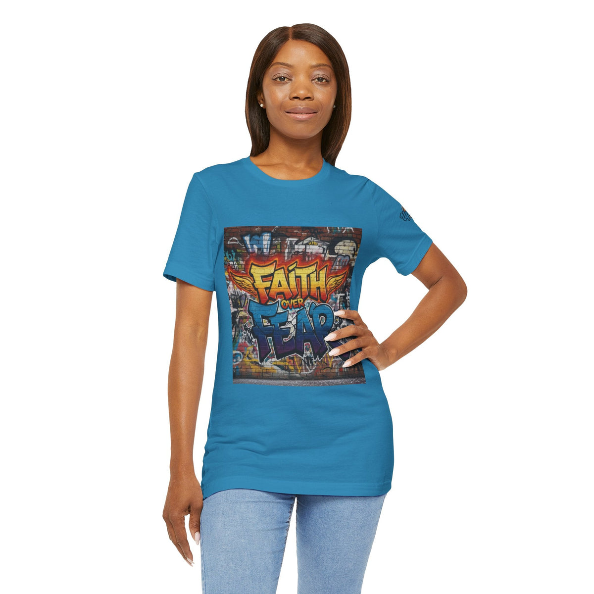 Faith Over Fear T-shirt – Graffiti Wall Christian T-shirt for Bold 2 Corinthians 5:7 Streetwear & Unshakable Faith Printify