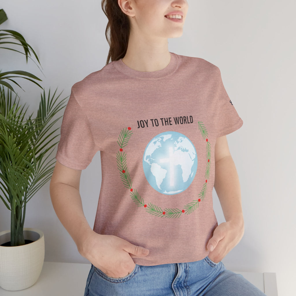 Joy to the World T-shirt – Wreath Earth Nativity Christian Christmas T-shirt for Isaiah 9:6 Holiday Faith & Festive Joy Printify