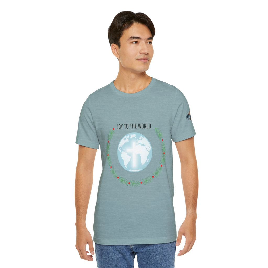 Joy to the World T-shirt – Wreath Earth Nativity Christian Christmas T-shirt for Isaiah 9:6 Holiday Faith & Festive Joy Printify