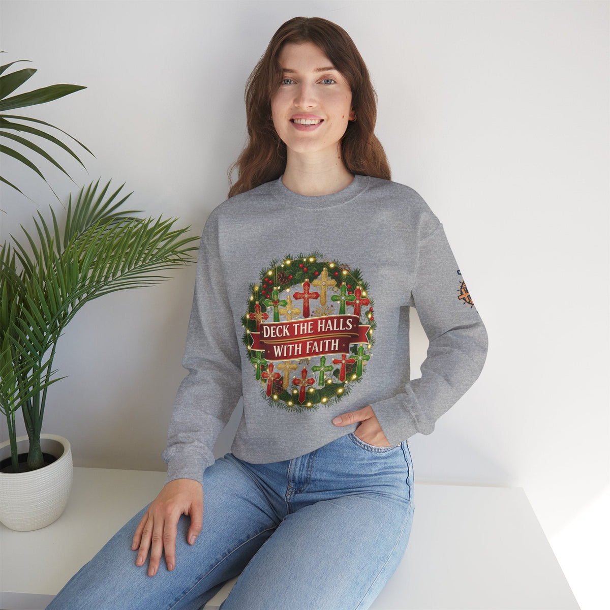 🎄 Deck the Halls with Faith – Christian Christmas Sweatshirt | Cross Ornament Design & Festive Garland | Bold Holiday Faith Tee by Uplifted Gear Printify