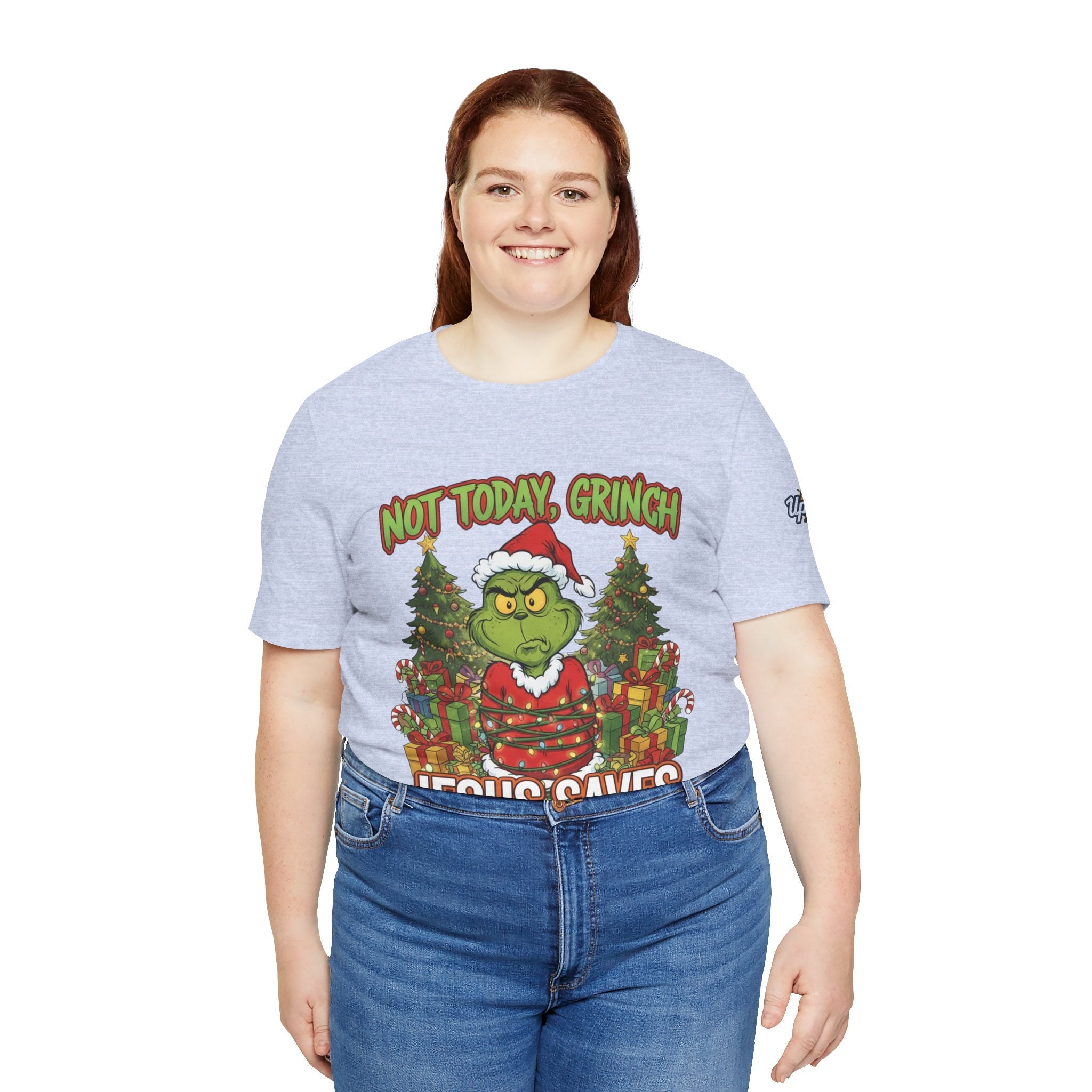 🎄 Not Today, Grinch – Jesus Saves | Funny Christian Christmas T-Shirt | Sulking Grinch & Glowing Cross | Bold Neon Faith Tee by Uplifted Gear Printify