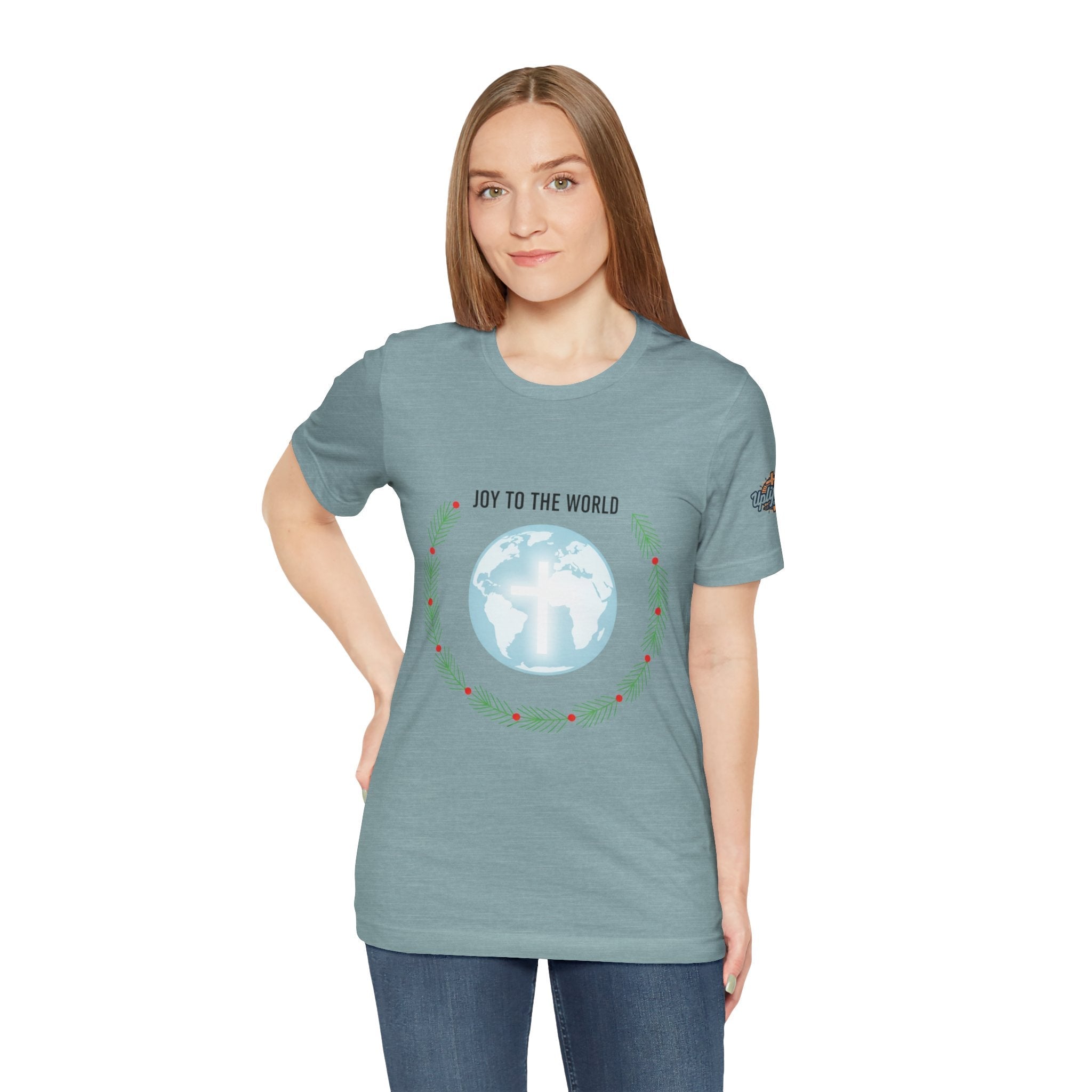 Joy to the World T-shirt – Wreath Earth Nativity Christian Christmas T-shirt for Isaiah 9:6 Holiday Faith & Festive Joy Printify