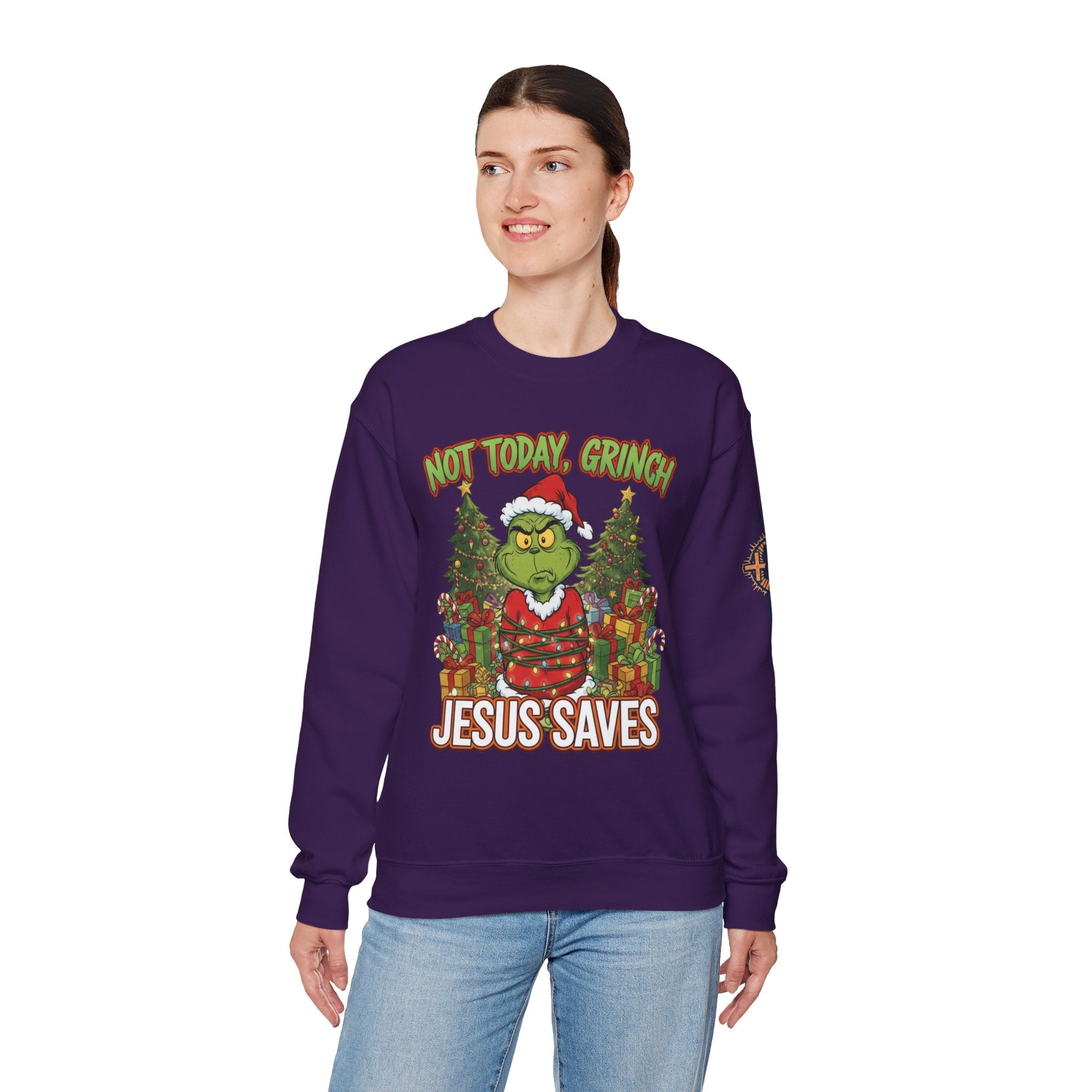🎄 Not Today, Grinch – Jesus Saves | Funny Christian Christmas Sweatshirt | Sulking Grinch & Glowing Cross | Bold Neon Faith Tee by Uplifted Gear Printify