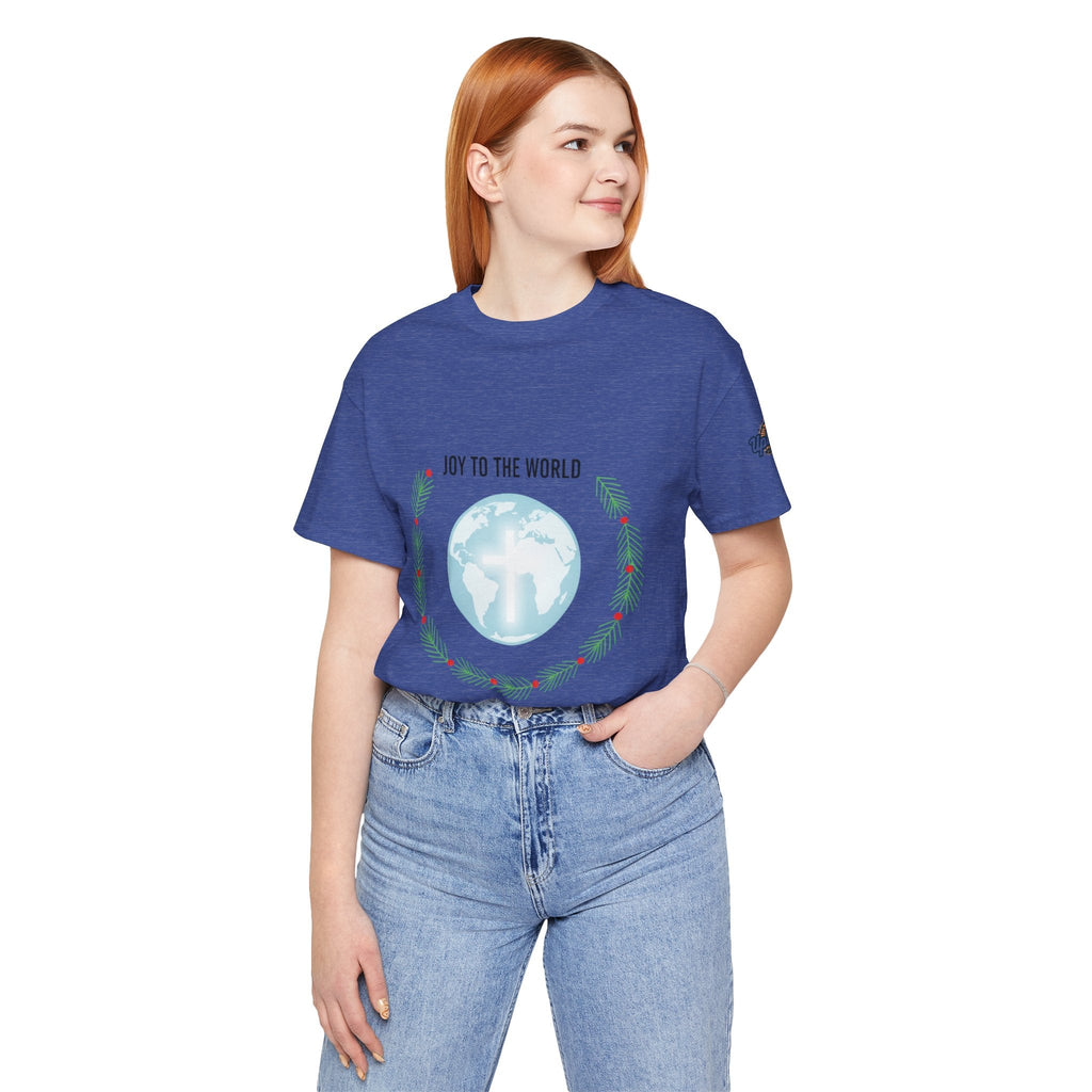 Joy to the World T-shirt – Wreath Earth Nativity Christian Christmas T-shirt for Isaiah 9:6 Holiday Faith & Festive Joy Printify