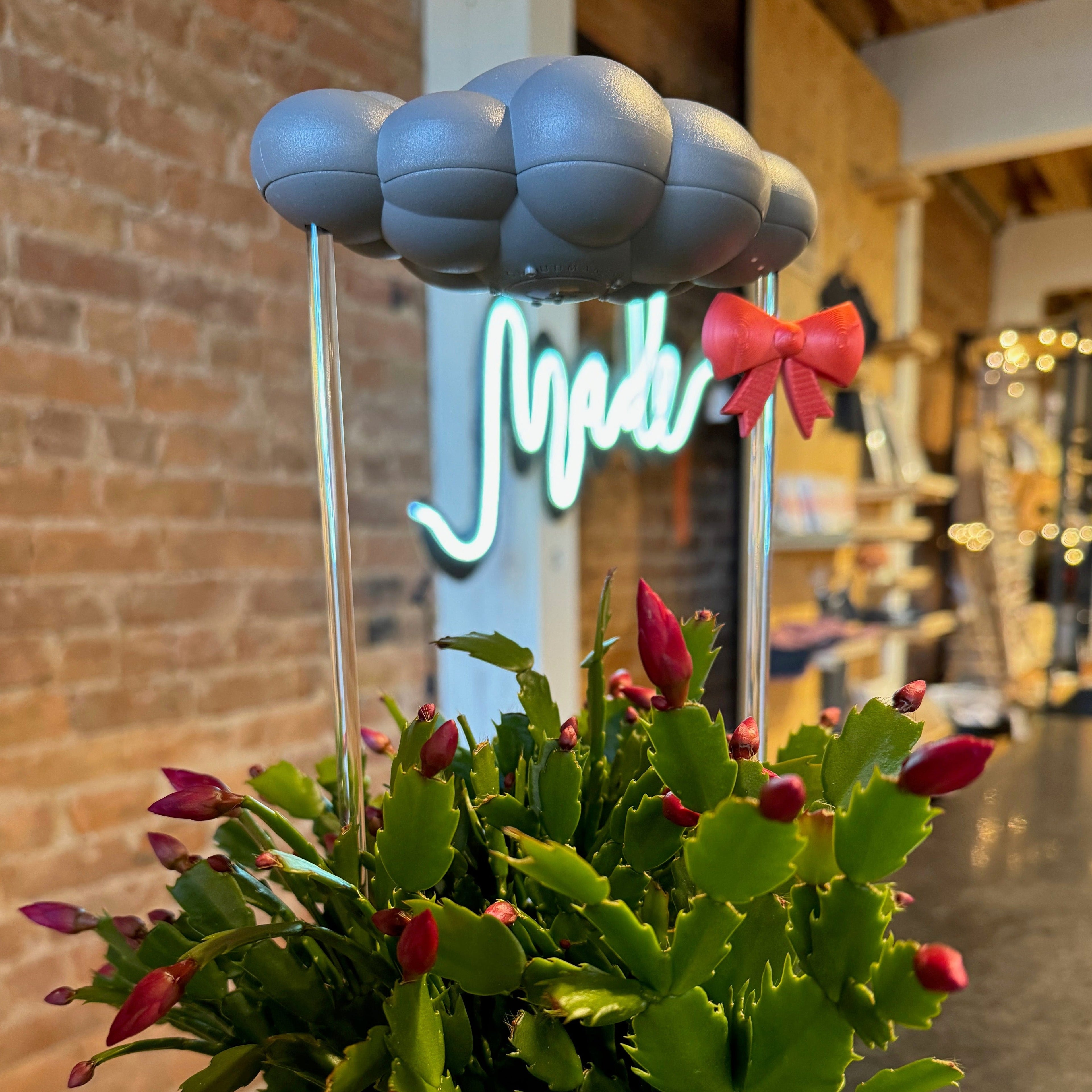 Stormy Dripping Rain Cloud with Bow Charm The Cloud Makers