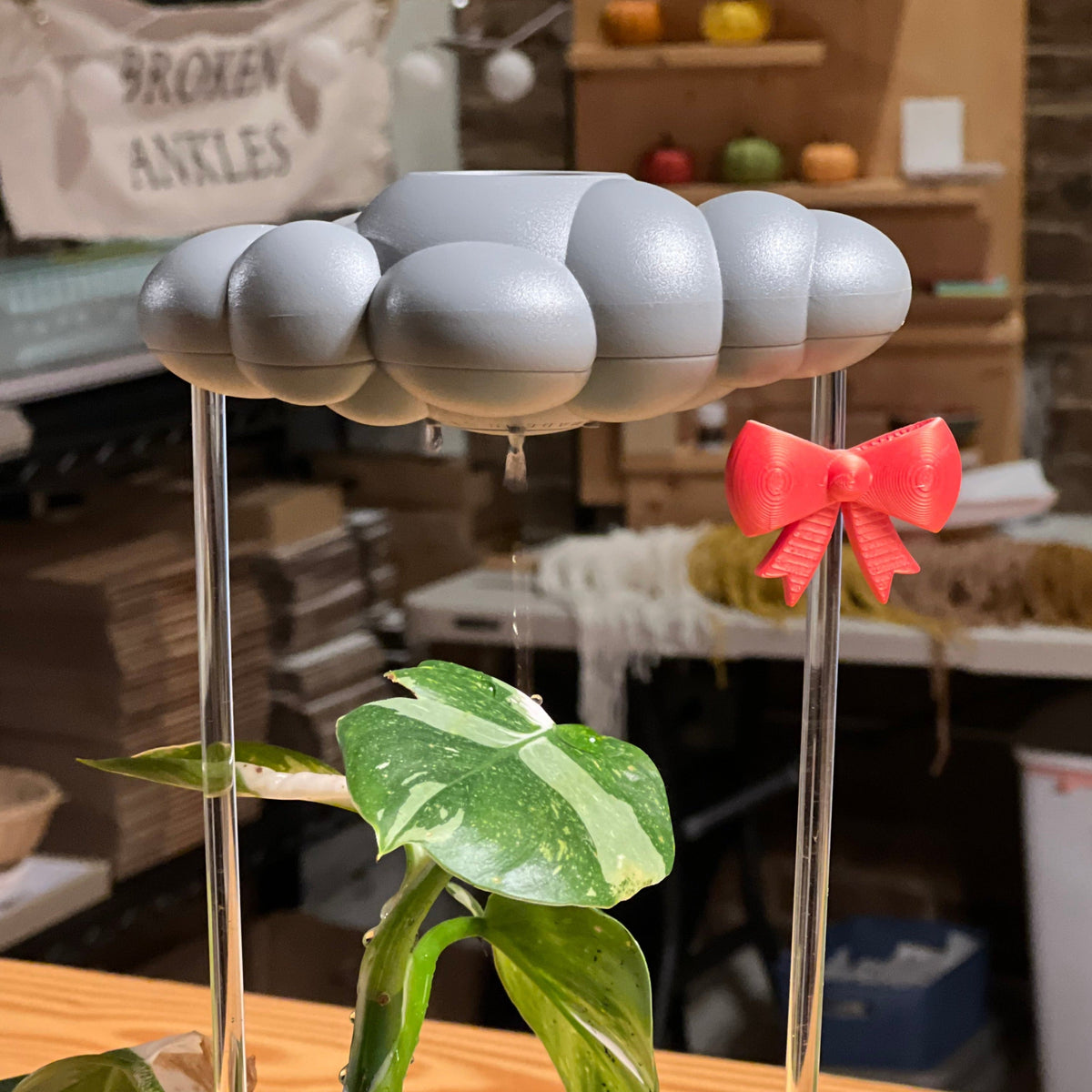 Stormy Dripping Rain Cloud with Bow Charm The Cloud Makers