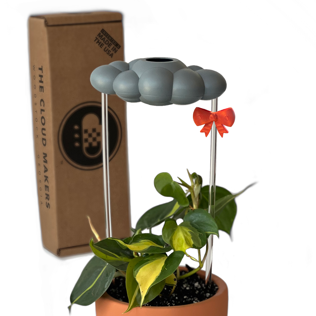 Stormy Dripping Rain Cloud with Bow Charm The Cloud Makers