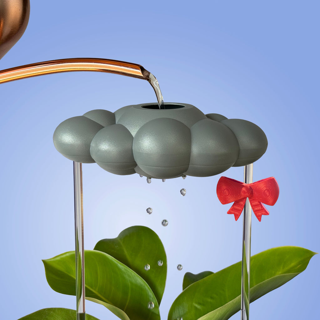 Stormy Dripping Rain Cloud with Bow Charm The Cloud Makers